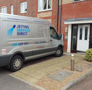 Drain maintenance for blocked drains in Grace Court, Crawley Road, Horsham, West Sussex RH12