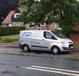 Clearing blocked drain at domestic property in Reigate Road, Dorking, Surrey RH4